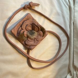 Adorable tiny softest FURLA bag for your tiny little lipstick and tampon.